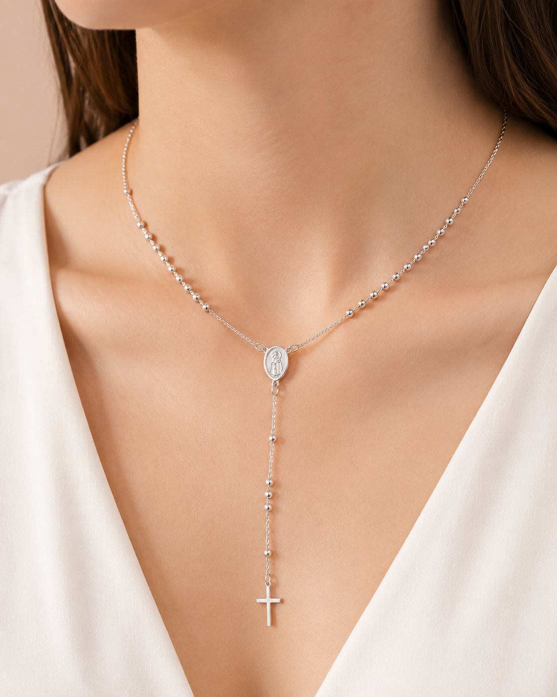 Model wearing COMPLIMENTI Gold Filled Rosary necklace