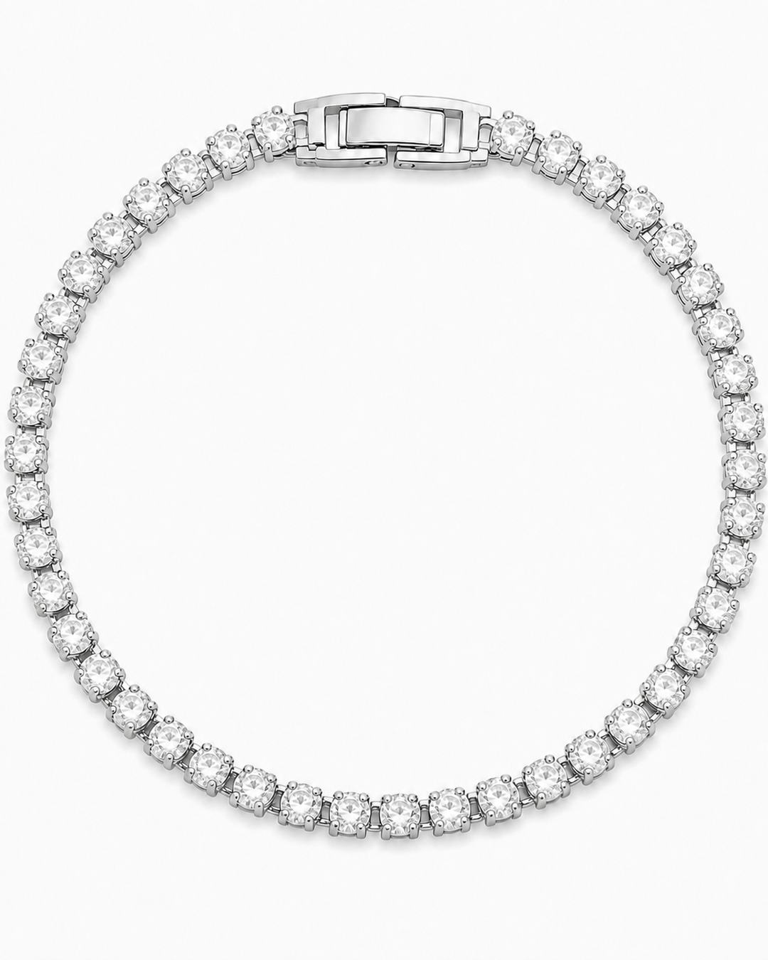 COMPLIMENTI gold-plated silver-tone clear tennis bracelet, 6-inch, catalog view on white background