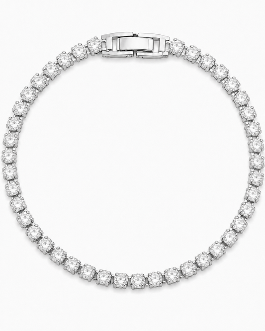 COMPLIMENTI gold-plated silver-tone clear tennis bracelet, 6-inch, catalog view on white background