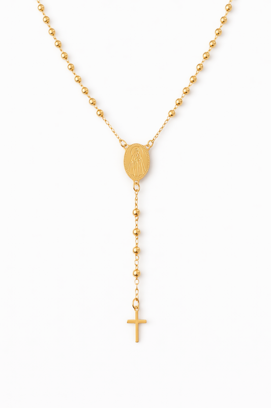 Gold-filled Virgen del Carmen rosary necklace on white background